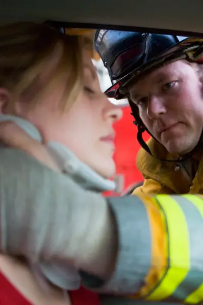Motor Vehicle Accidents 3 a firefighter helping a woman