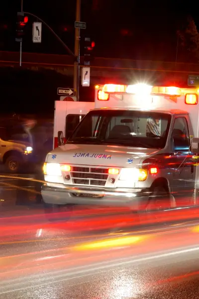 Motor Vehicle Accidents 2 a ambulance on the road at night