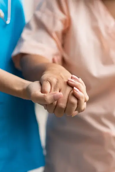Medical Malpractice 5 a close-up of a person holding hands