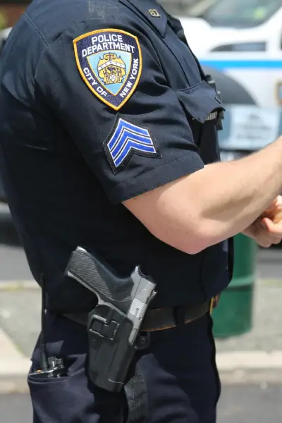 Police Brutality 2 a police officer with a gun