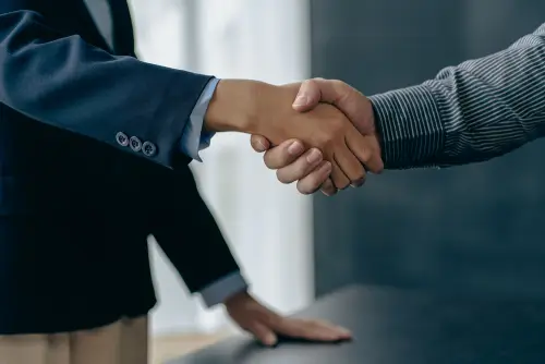 people shaking hands wbp